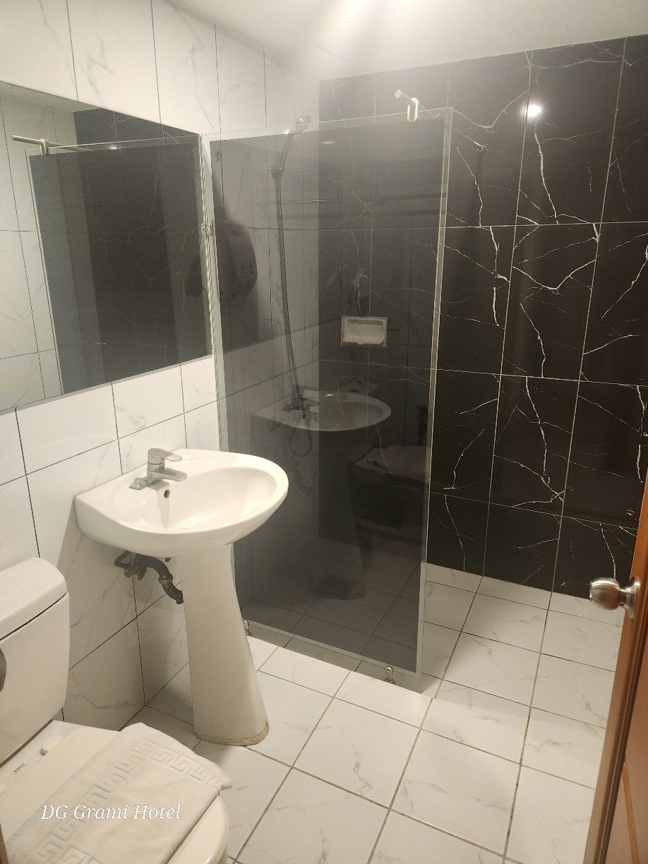 Private bathroom with hot and cold shower